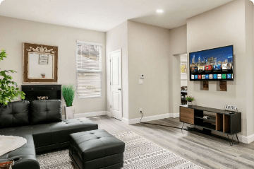 Spacious Living Room with Sofa and Television | GHLUX Properties